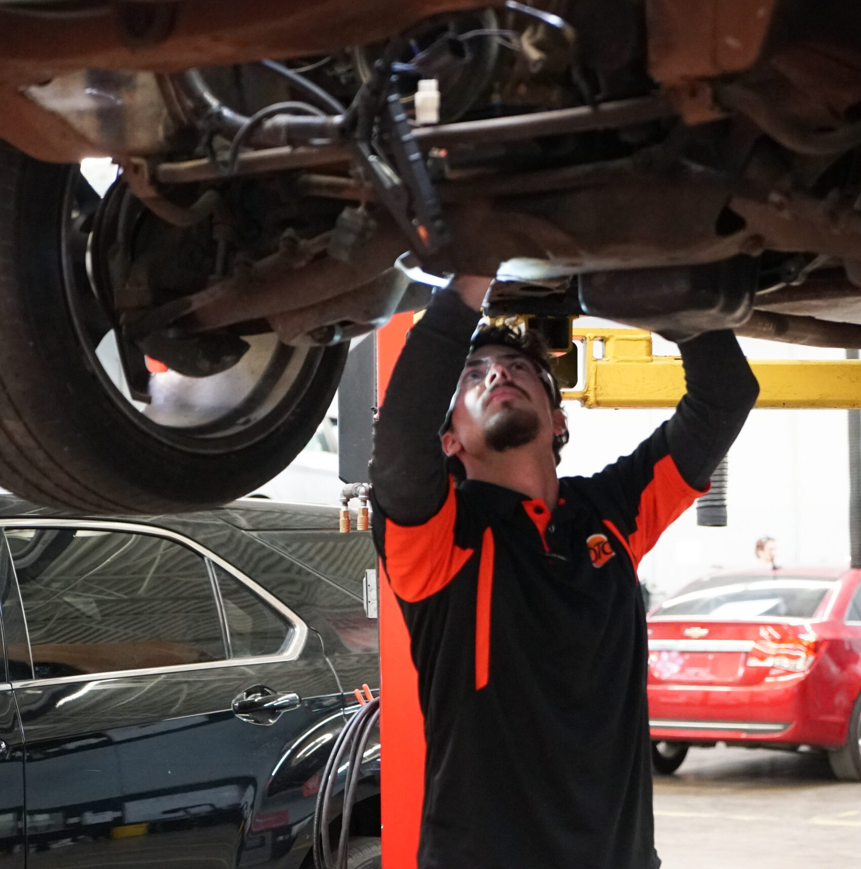 Oklahoma Technical College Automotive Technology Class - Student working on car